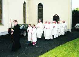 Joe Hughes leads the procession